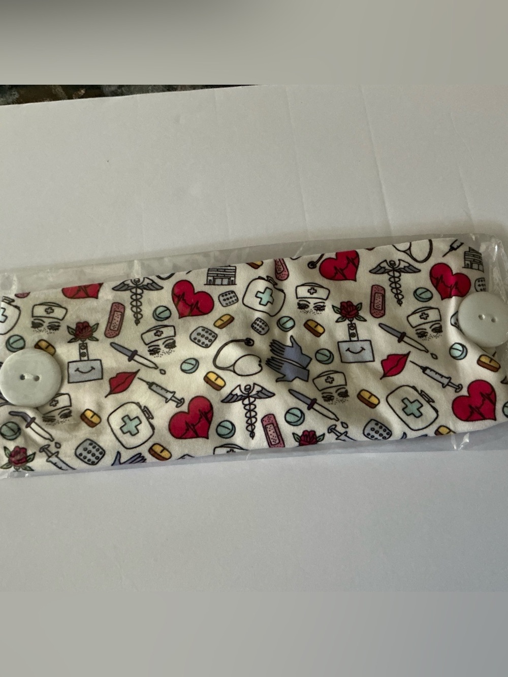Healthcare Print Button Headband - White with Red and Blue Nursing Motif